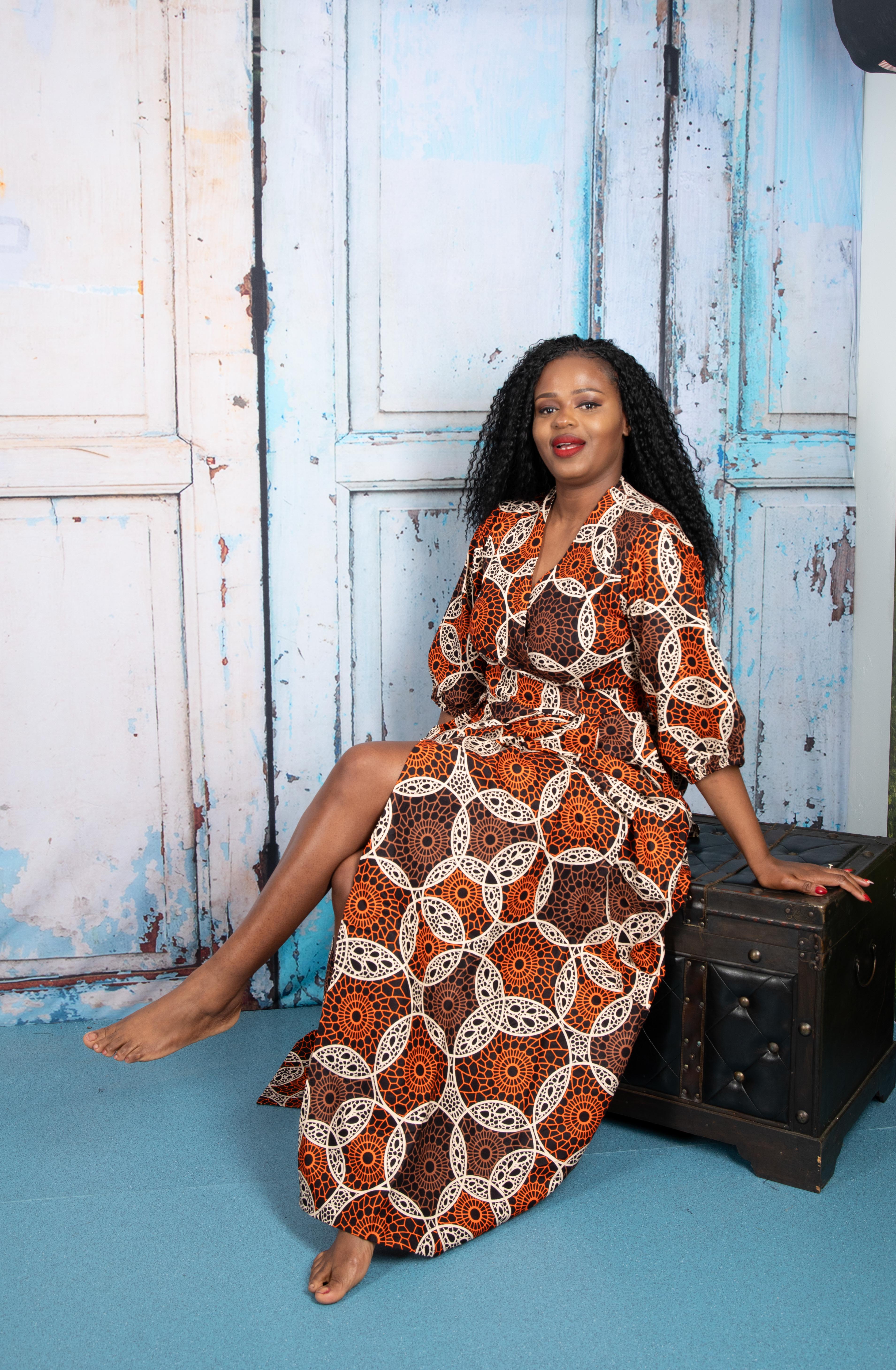 temad collections wrap dress, orange wrap dress, african print wrap dress, brown ankara wrap dress, african print midi dress, orange african print maxi dress, african print floor length dress, african print short sleeves dress, african print wrap maxi dress, ankara green wrap dress, ankara maxi wrap dress, modern african print dress, stylish wrap dress, maxi african print dress, puff sleeves wrap dress, long african print dress, long ankara wrap dress