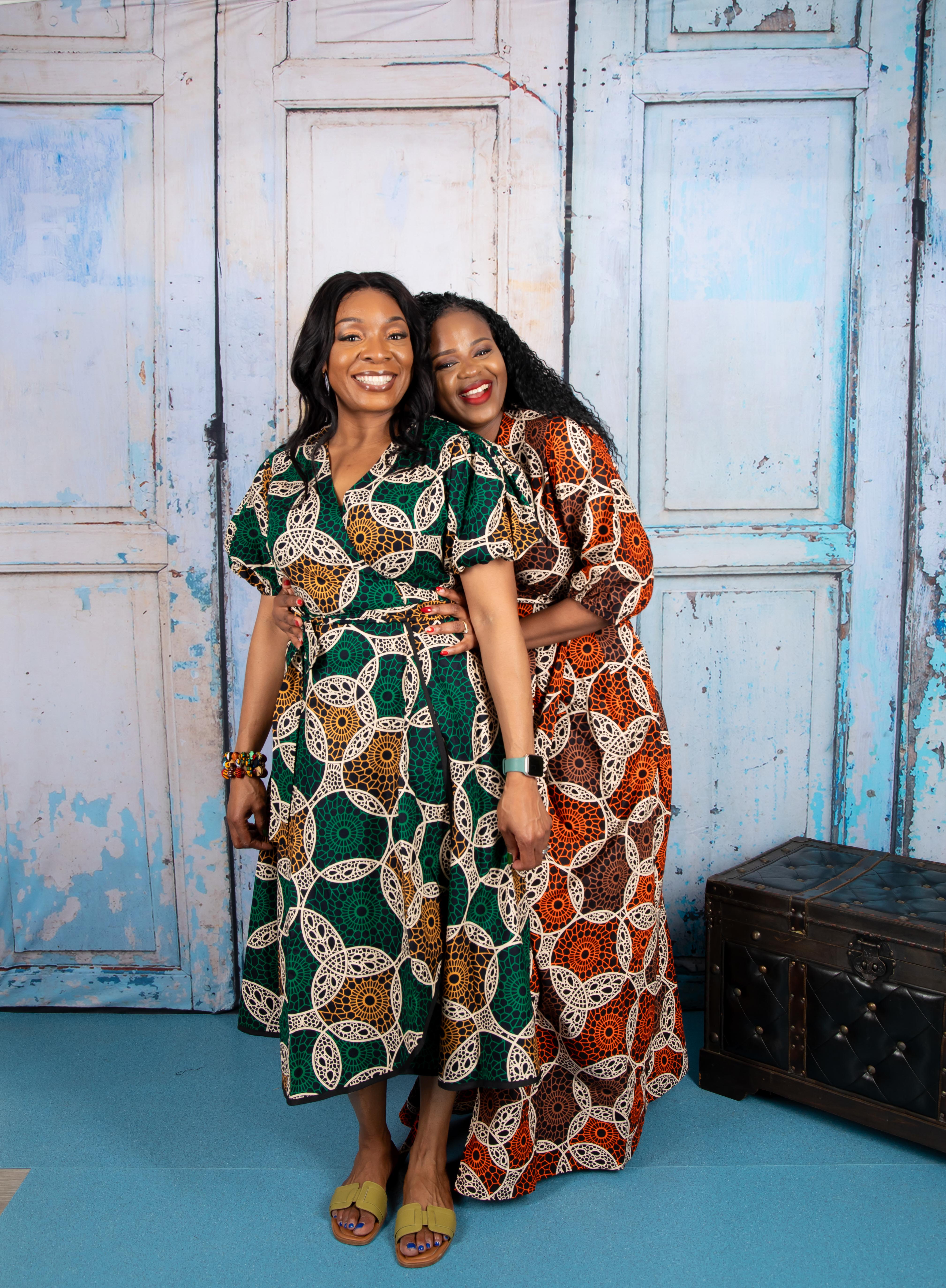 temad collections wrap dress, orange wrap dress, african print wrap dress, brown ankara wrap dress, african print midi dress, orange african print maxi dress, african print floor length dress, african print short sleeves dress, african print wrap maxi dress, ankara green wrap dress, ankara maxi wrap dress, modern african print dress, stylish wrap dress, maxi african print dress, puff sleeves wrap dress, long african print dress, long ankara wrap dress