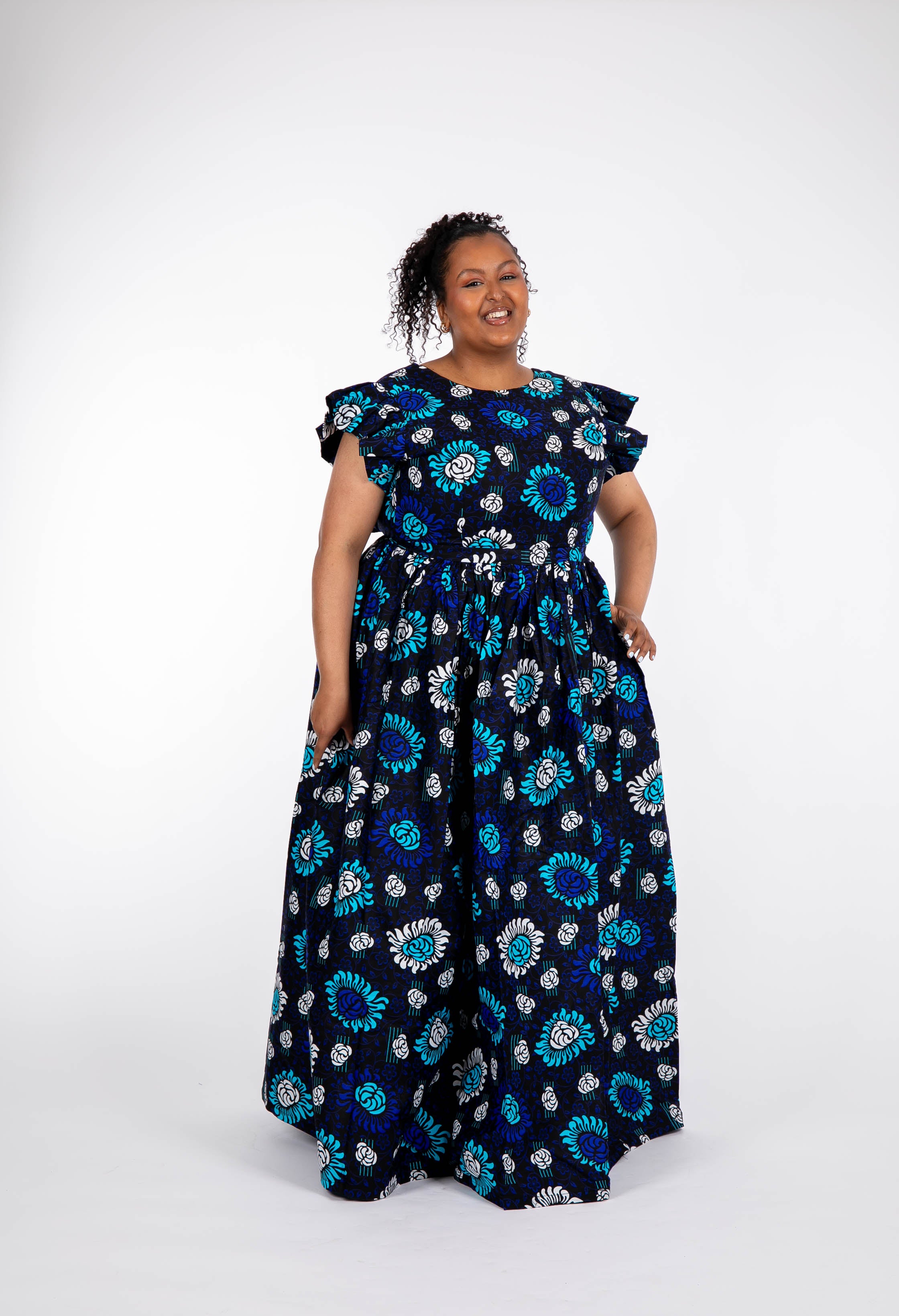 Temad collections Guapa African print ankara maxi dress, Stylish African print dresses, Modern African dresses, Ankara dress for ladies, Latest Ankara dresses, Long Ankara dresses, ankara dresses Uk, Ankara dresses styles, stylish Ankara dresses, beautiful African dresses, African Ankara dresses for ladies, African dresses styles, ankara print, ankara maxi dresses, Ankara midi dresses, African print bow dresses, African square sleeves dress, African midi dress, African short sleeves dress