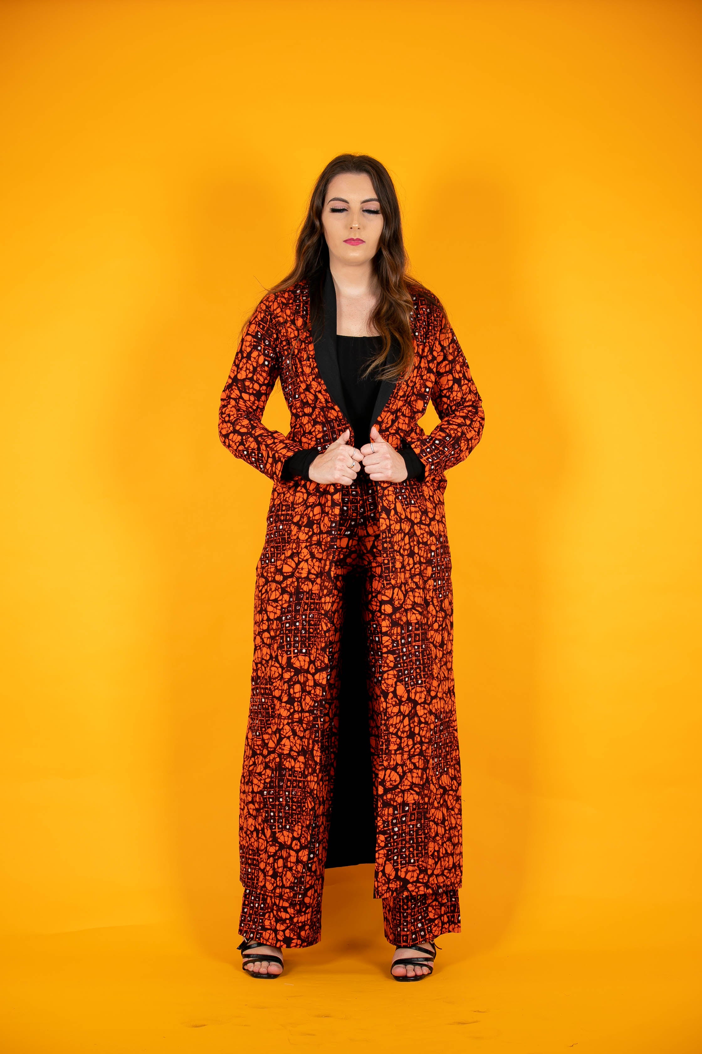 TemAD collections african print ankara imuse orange black jacket with wide leg palazzo trousers, Stylish African print bottoms and tops, African print Ankara fabric, African trousers, African palazzo , African pants , African print casual palazzo , African trousers for ladies, African flared trousers, Ankara palazzo, Ankara trousers, Ankara pants, latest Ankara palazzo, african palazzo and tops