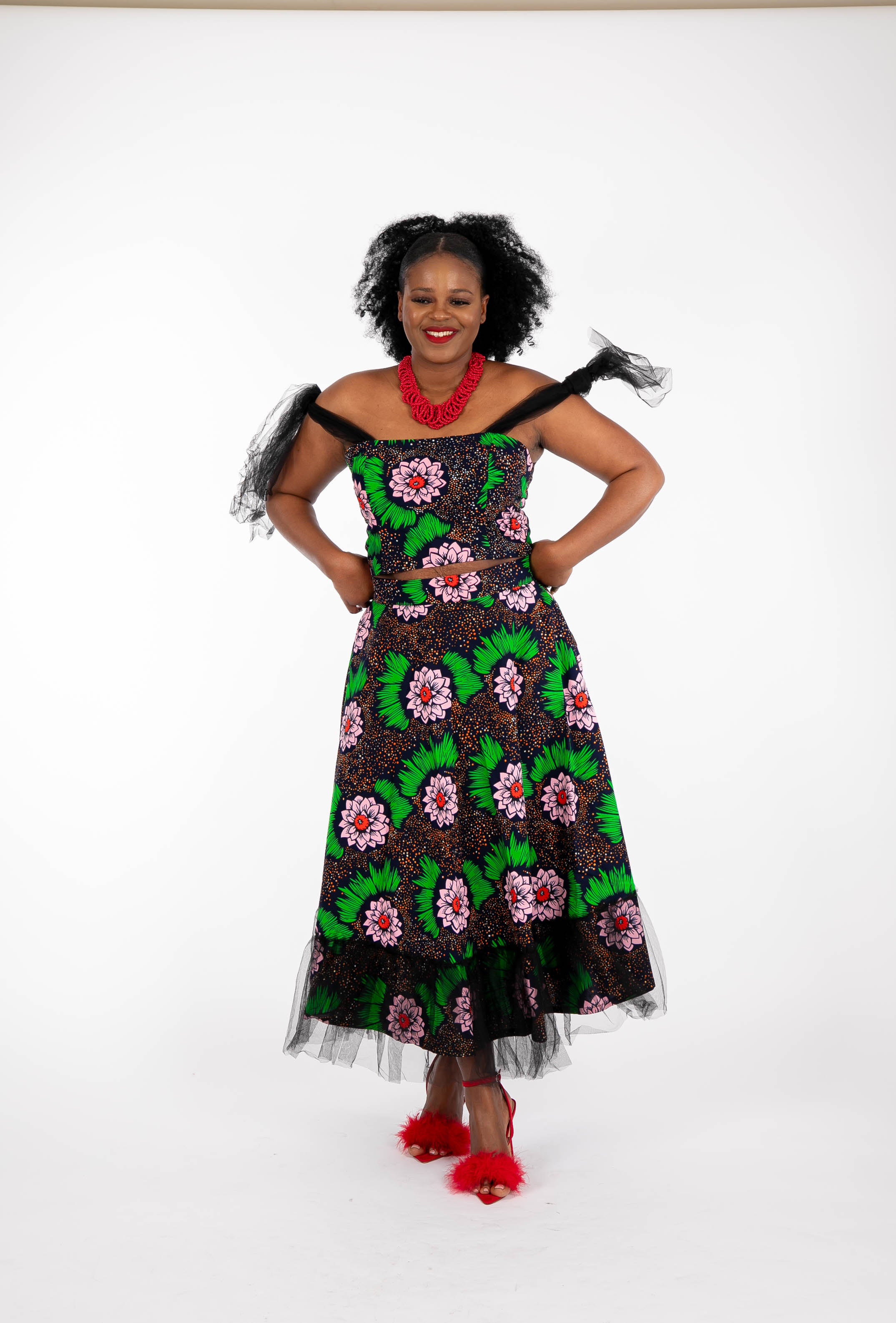 Temad collections Carino african print ankara tulle circle skirt and crop top, Stylish African print skirts and tops, African print Ankara fabric, African tulle crop top, African crop top , African crop top , African print casual crop top , African crop top for ladies, African flared trousers, Ankara crop top, Ankara top, Ankara crop top, latest Ankara shorts, african floral shorts and tops, stylish african top, african crop top matching skirt