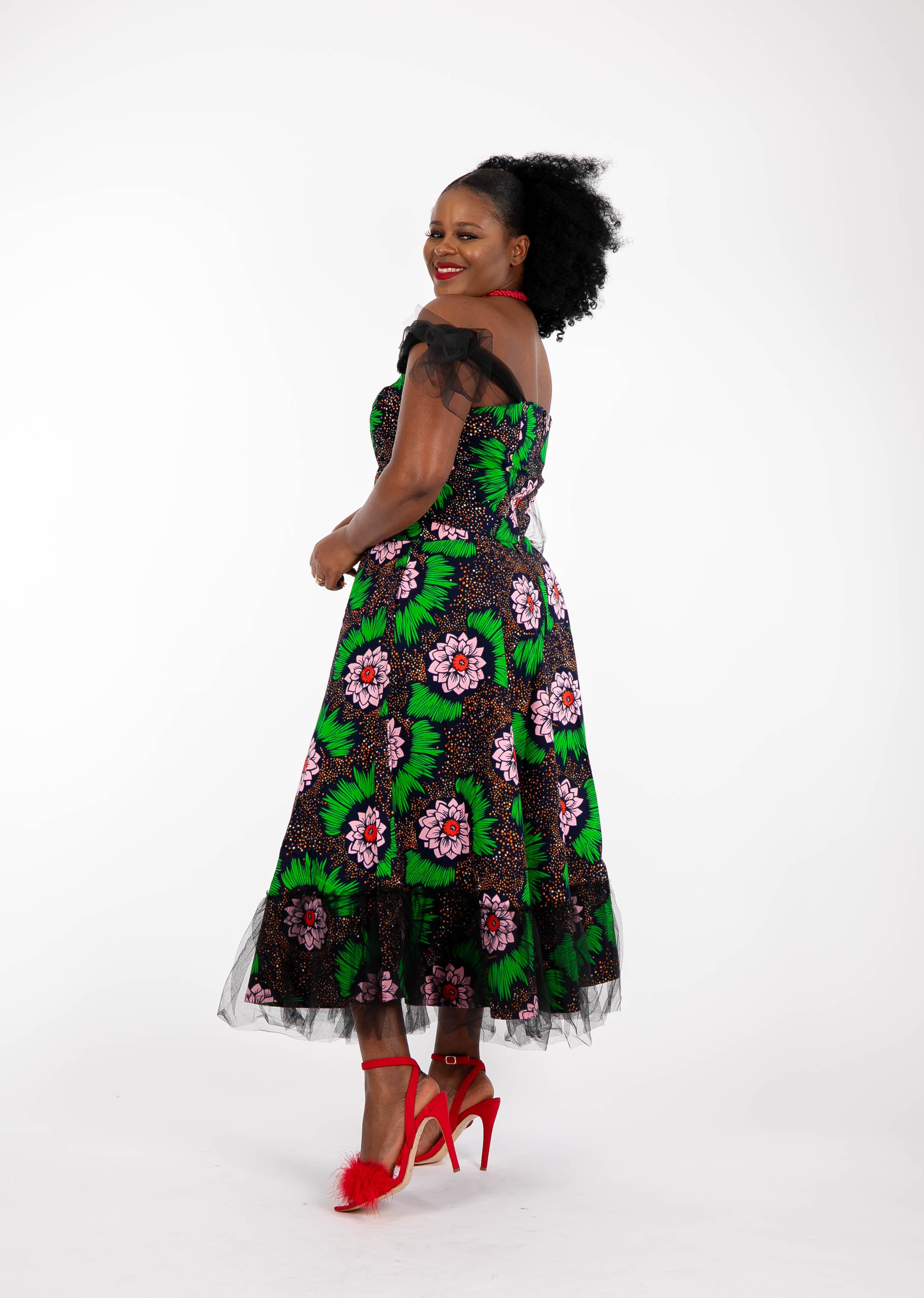 Temad collections Carino african print ankara tulle circle skirt and crop top, Stylish African print skirts and tops, African print Ankara fabric, African tulle crop top, African crop top , African crop top , African print casual crop top , African crop top for ladies, African flared trousers, Ankara crop top, Ankara top, Ankara crop top, latest Ankara shorts, african floral shorts and tops, stylish african top, african crop top matching skirt