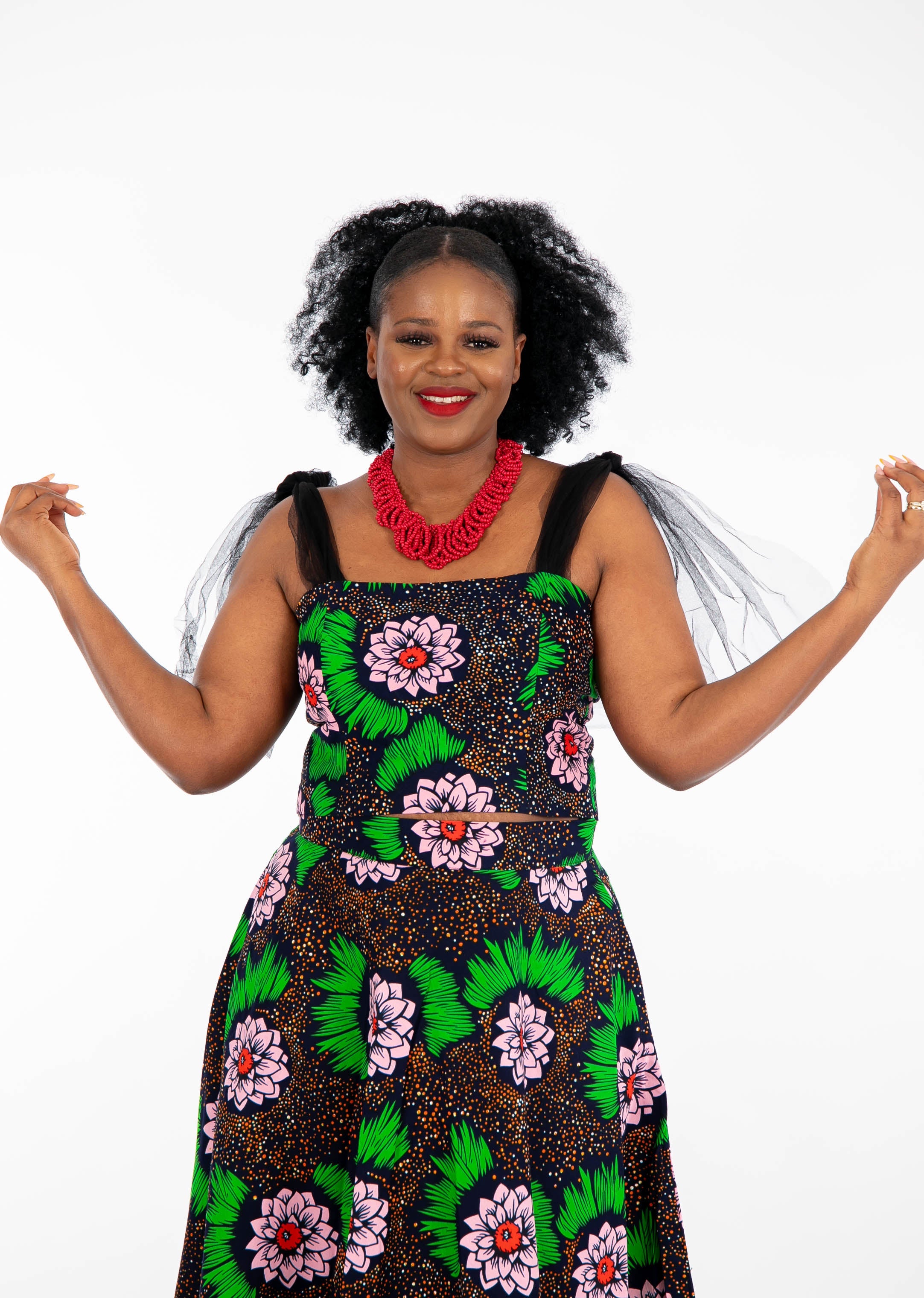 Temad collections Carino african print ankara tulle circle skirt and crop top, Stylish African print skirts and tops, African print Ankara fabric, African tulle crop top, African crop top , African crop top , African print casual crop top , African crop top for ladies, African flared trousers, Ankara crop top, Ankara top, Ankara crop top, latest Ankara shorts, african floral shorts and tops, stylish african top, african crop top matching skirt