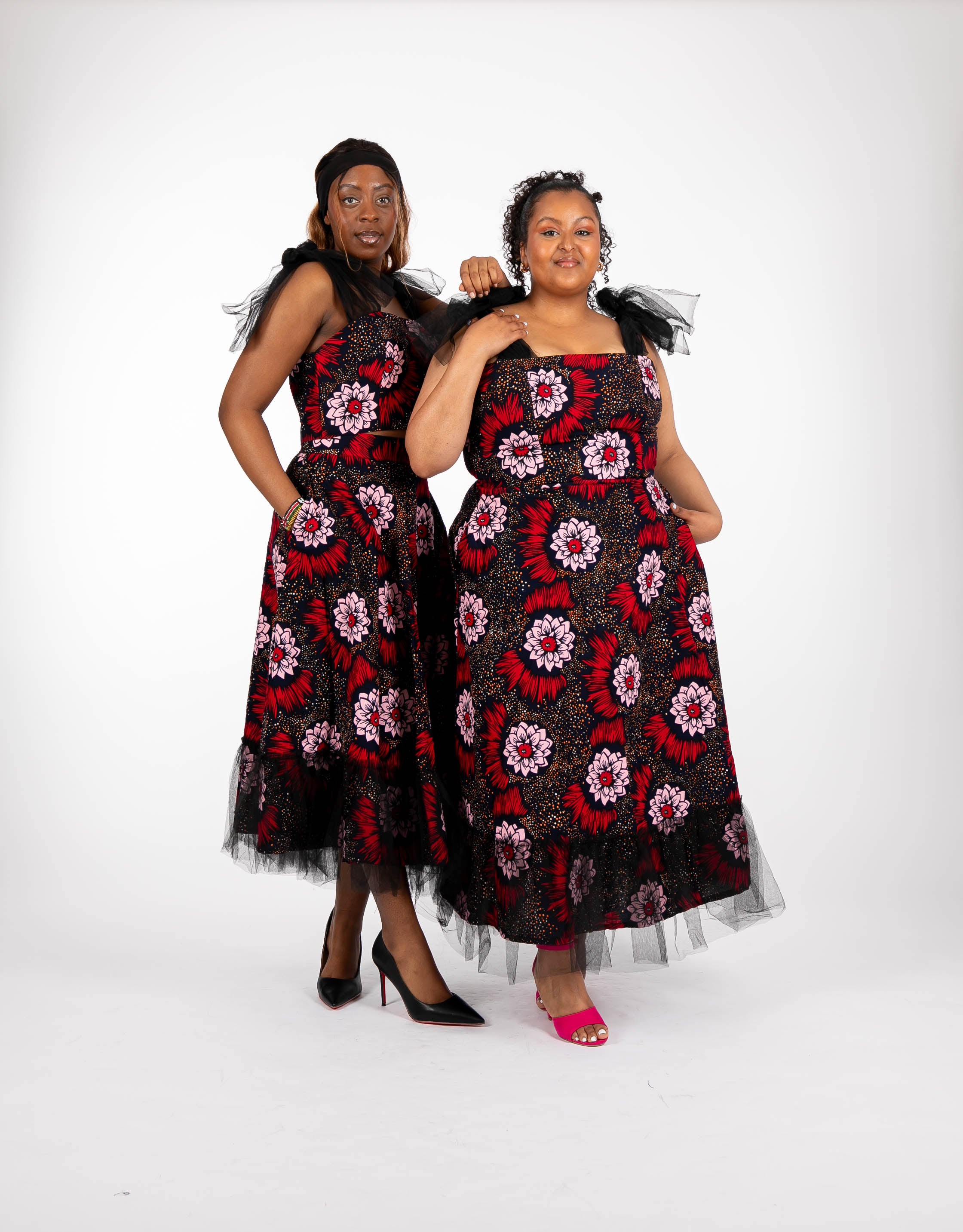 Temad collections Carino african print ankara tulle circle skirt and crop top, Stylish African print skirts and tops, African print Ankara fabric, African tulle crop top, African crop top , African crop top , African print casual crop top , African crop top for ladies, African flared trousers, Ankara crop top, Ankara top, Ankara crop top, latest Ankara shorts, african floral shorts and tops, stylish african top, african crop top matching skirt