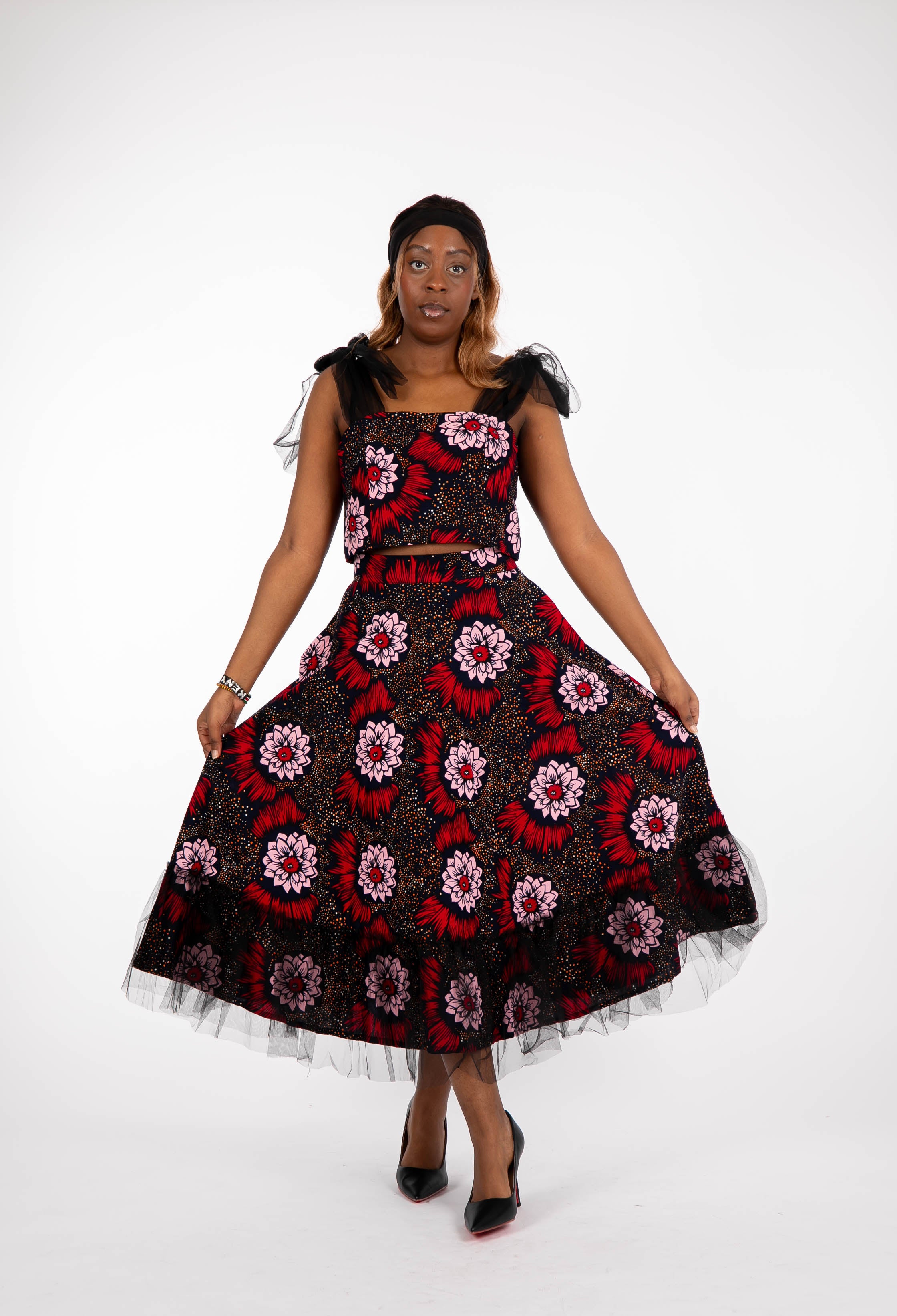 Temad collections Carino african print ankara midi skirt,Stylish African print skirt, Modern African skirt, Ankara skirt for ladies, Latest Ankara skirt, ankara skirt Uk, Ankara skirt styles, stylish Ankara skirt, beautiful African skirt, African Ankara skirt for ladies, African skirt styles, Ankara midi skirt, Ankara tulle skirt, African long skirt, African short skirt, red floral skirt, green floral skirt, ankle length skirt