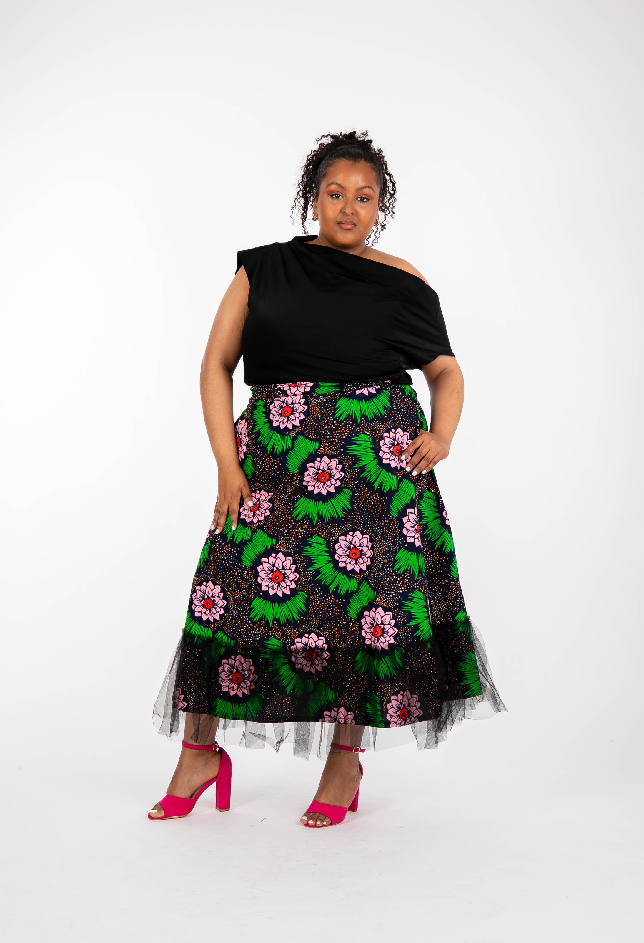 Temad collections Carino african print ankara midi skirt,Stylish African print skirt, Modern African skirt, Ankara skirt for ladies, Latest Ankara skirt, ankara skirt Uk, Ankara skirt styles, stylish Ankara skirt, beautiful African skirt, African Ankara skirt for ladies, African skirt styles, Ankara midi skirt, Ankara tulle skirt, African long skirt, African short skirt, red floral skirt, green floral skirt, ankle length skirt