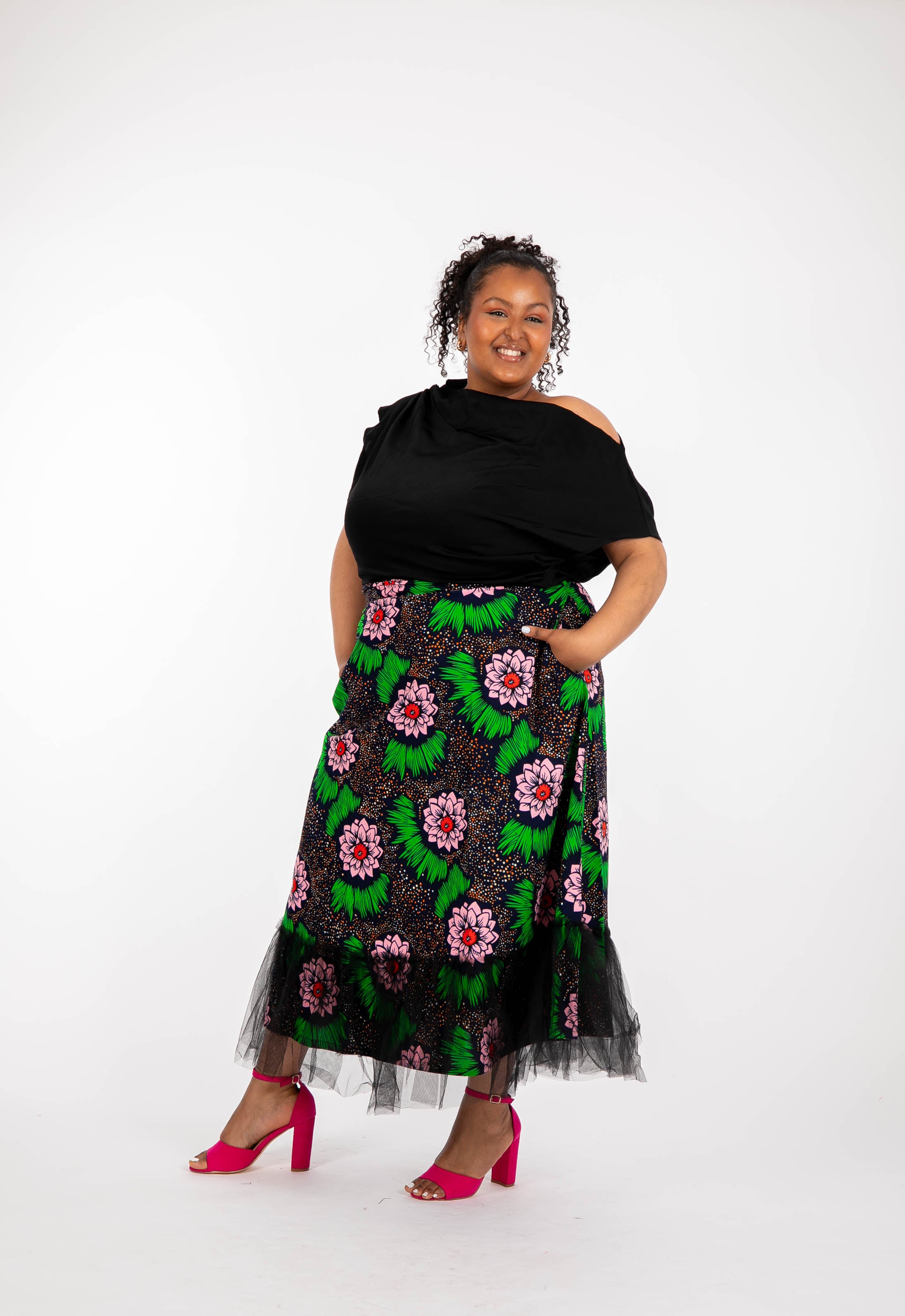 Temad collections  Carino  african print ankara midi skirt,Stylish African print skirt, Modern African skirt, Ankara skirt for ladies, Latest Ankara skirt, ankara skirt Uk, Ankara skirt styles, stylish Ankara skirt, beautiful African skirt, African Ankara skirt for ladies, African skirt styles, Ankara midi skirt, Ankara tulle skirt,  African long skirt, African short skirt,  red floral skirt, green floral skirt, ankle length skirt