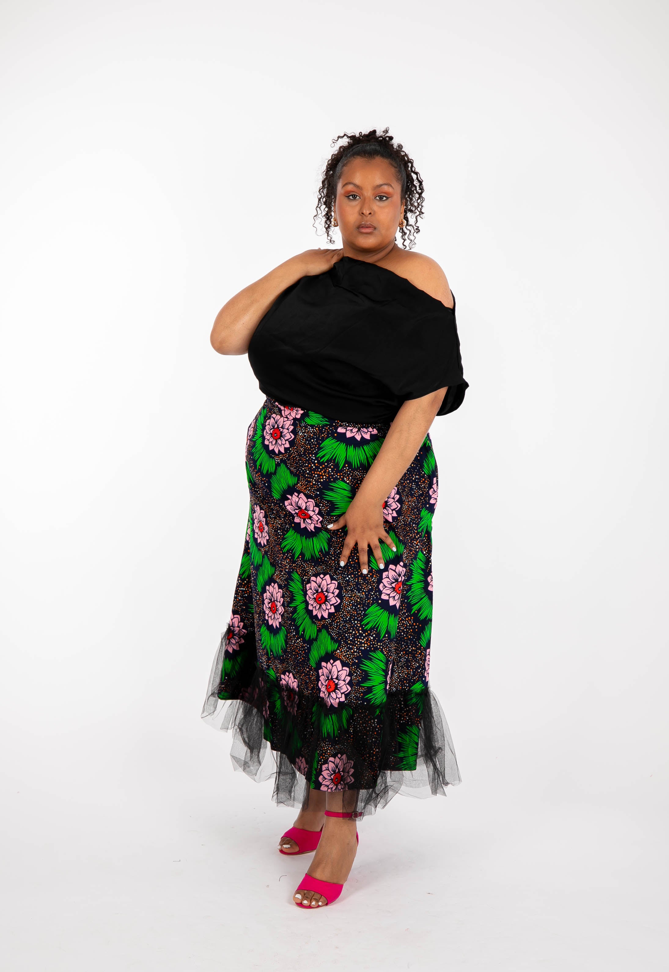 Temad collections Carino african print ankara midi skirt,Stylish African print skirt, Modern African skirt, Ankara skirt for ladies, Latest Ankara skirt, ankara skirt Uk, Ankara skirt styles, stylish Ankara skirt, beautiful African skirt, African Ankara skirt for ladies, African skirt styles, Ankara midi skirt, Ankara tulle skirt, African long skirt, African short skirt, red floral skirt, green floral skirt, ankle length skirt