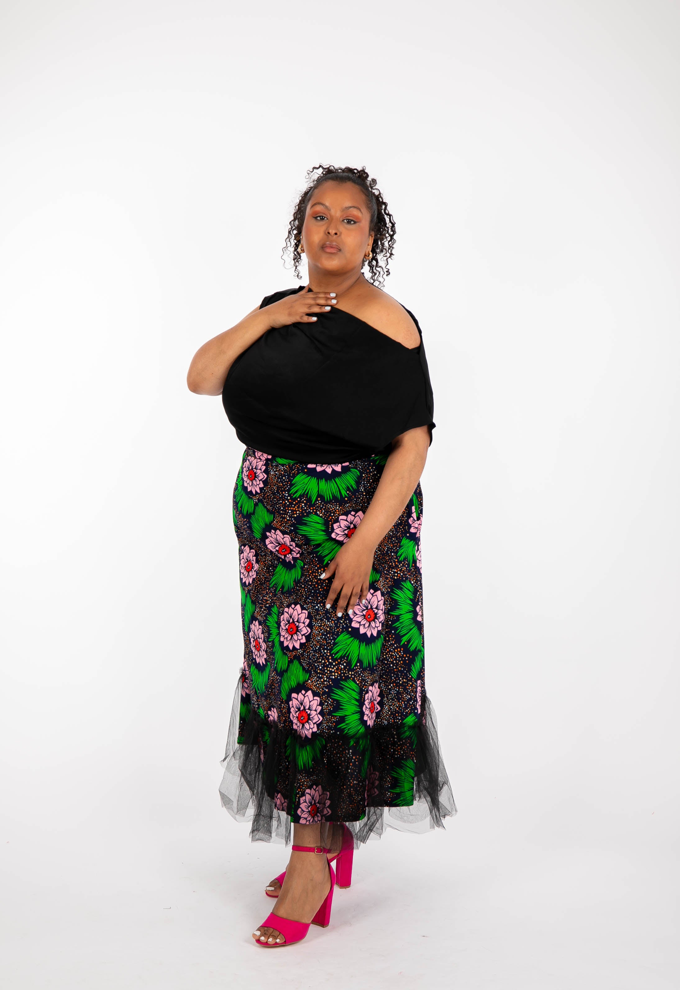 Temad collections Carino african print ankara midi skirt,Stylish African print skirt, Modern African skirt, Ankara skirt for ladies, Latest Ankara skirt, ankara skirt Uk, Ankara skirt styles, stylish Ankara skirt, beautiful African skirt, African Ankara skirt for ladies, African skirt styles, Ankara midi skirt, Ankara tulle skirt, African long skirt, African short skirt, red floral skirt, green floral skirt, ankle length skirt