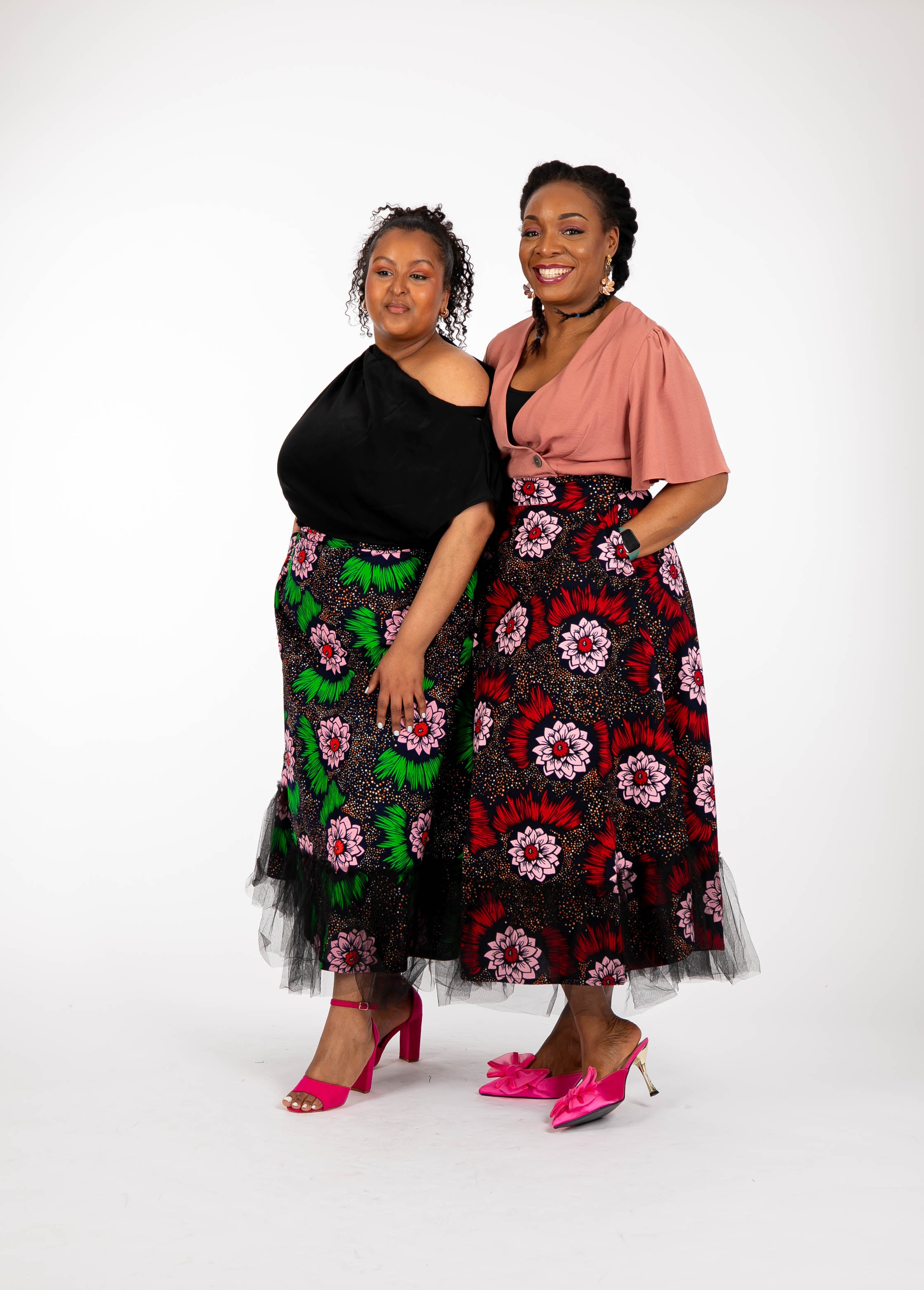 Temad collections Carino african print ankara midi skirt,Stylish African print skirt, Modern African skirt, Ankara skirt for ladies, Latest Ankara skirt, ankara skirt Uk, Ankara skirt styles, stylish Ankara skirt, beautiful African skirt, African Ankara skirt for ladies, African skirt styles, Ankara midi skirt, Ankara tulle skirt, African long skirt, African short skirt, red floral skirt, green floral skirt, ankle length skirt