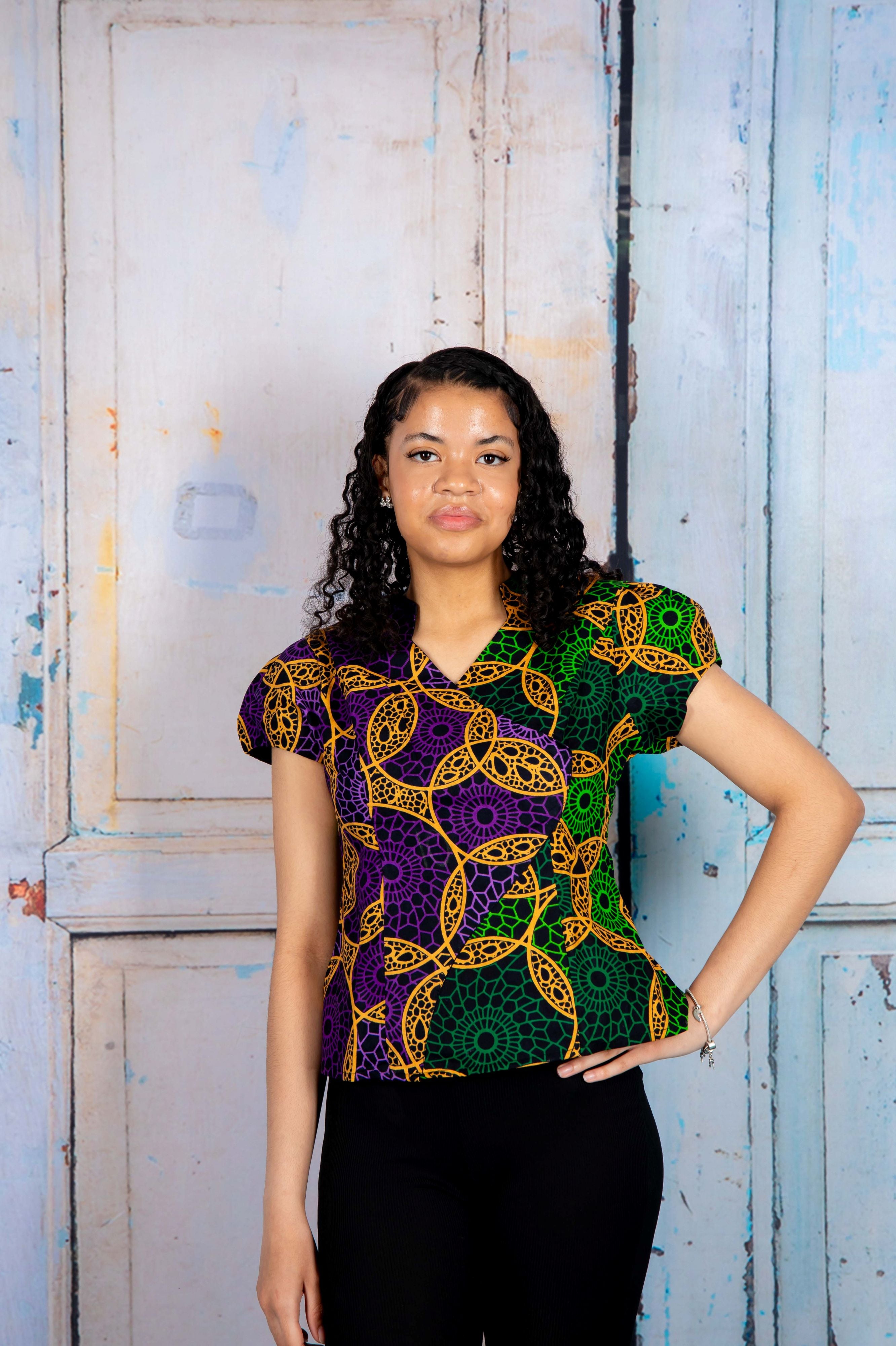 Temad collections Iye african print ankara palazzo, Stylish African print bottoms and tops, African print Ankara fabric, African trousers, African shirt , African blouse , African print casual palazzo , African shirt for ladies, African flared trousers, Ankara palazzo, Ankara blouse, Ankara blouse, latest Ankara blouse, african palazzo and top, stylish african blouse, green blouse , african print green wrap blouse, african print wrap blouse, african print stylish blouse, green wrap top, green wrap top