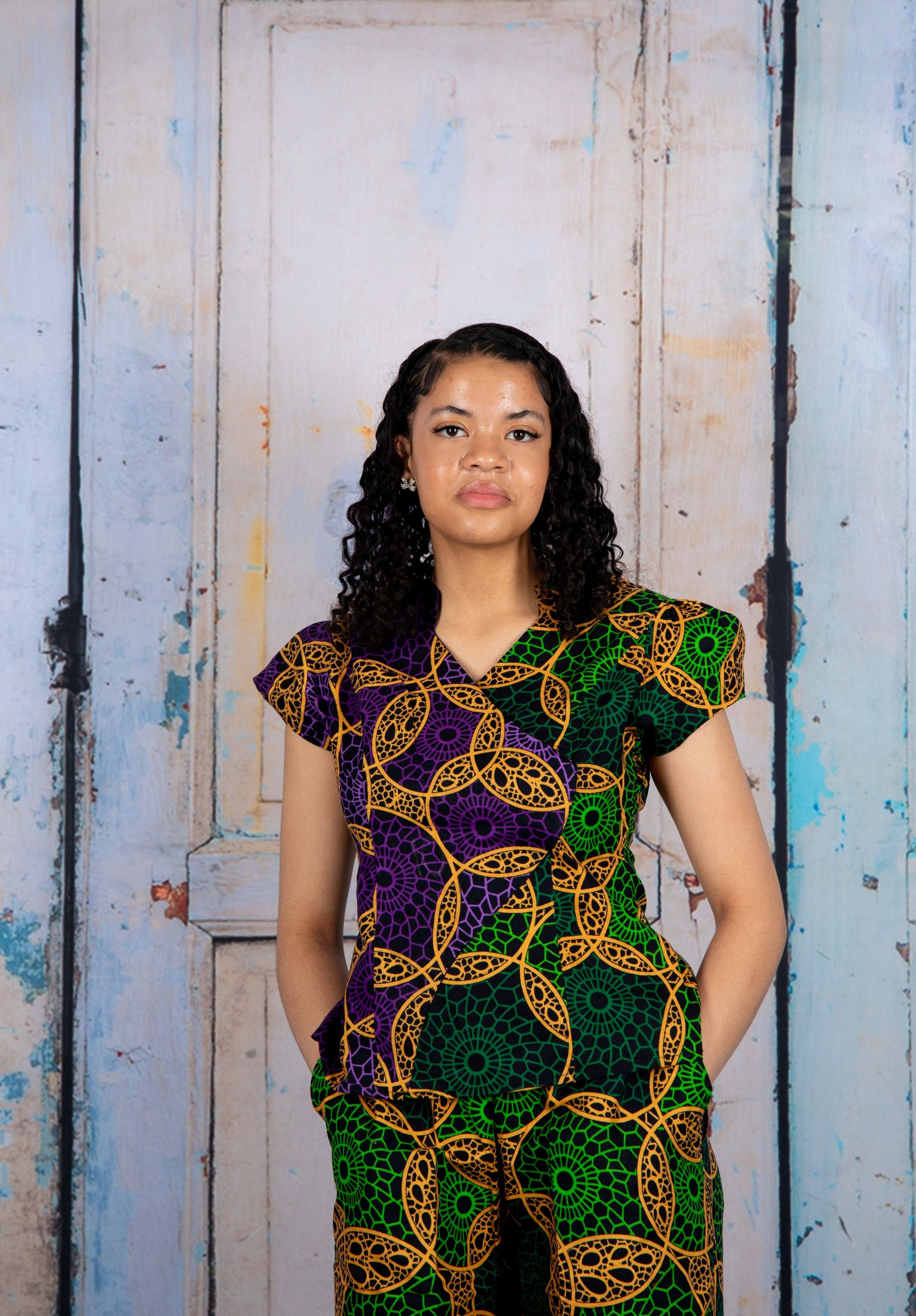 Temad collections Iye african print ankara palazzo, Stylish African print bottoms and tops, African print Ankara fabric, African trousers, African shirt , African blouse , African print casual palazzo , African shirt for ladies, African flared trousers, Ankara palazzo, Ankara blouse, Ankara blouse, latest Ankara blouse, african palazzo and top, stylish african blouse, green blouse , african print green wrap blouse, african print wrap blouse, african print stylish blouse, green wrap top, green wrap top