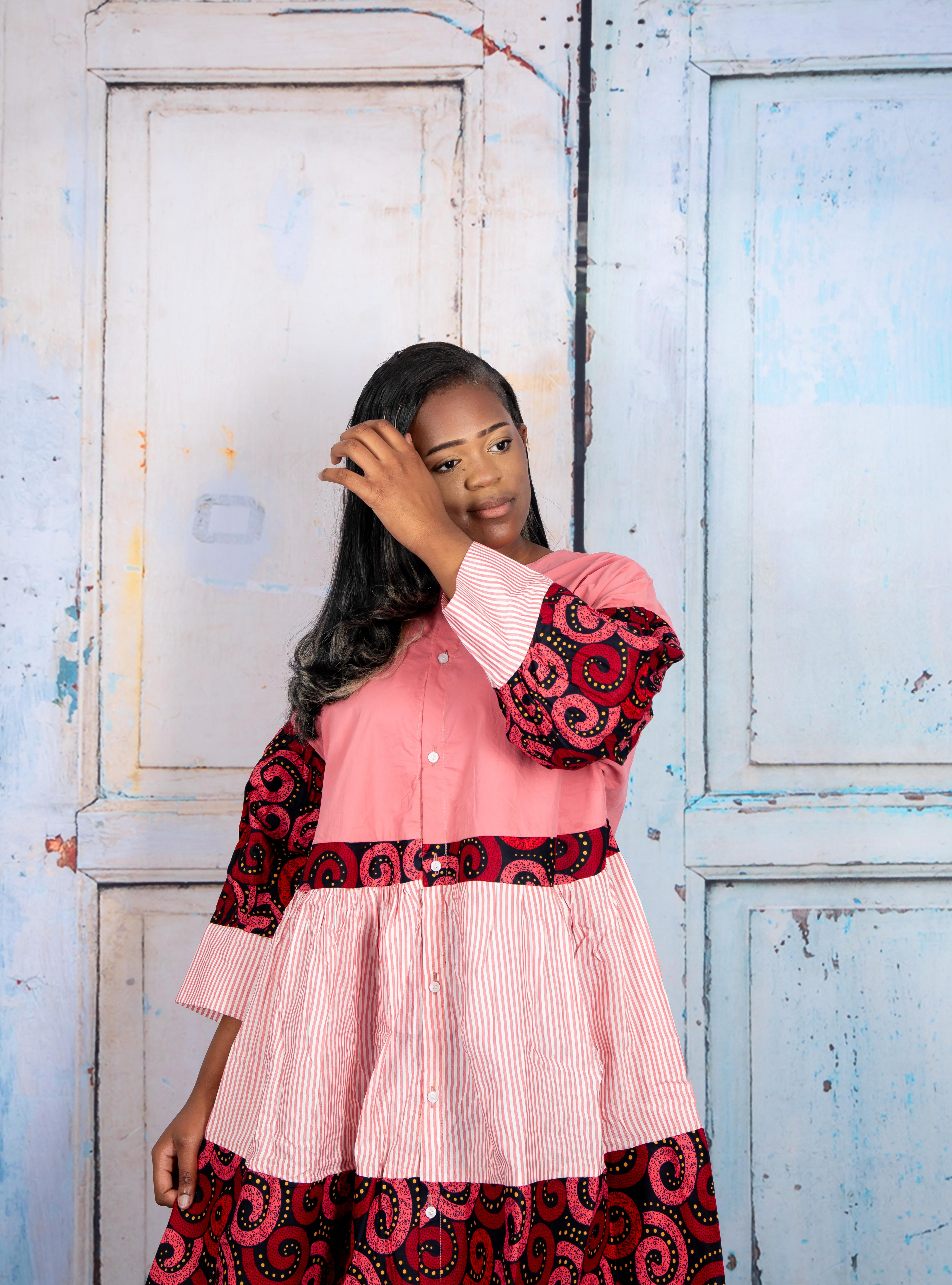 african print dress, african print ankara dress, african print loose fitting dress, african print shirt dress, african print buttoned dress, pink african print dress, pink african print knee length dress, pink shirt dress, temad collections dress, ankara knee length dress, ankara free dress, pink ankara dress, pink ankara shirt dress, free fitting african print dress, modern african print dress, elegant african print dress
