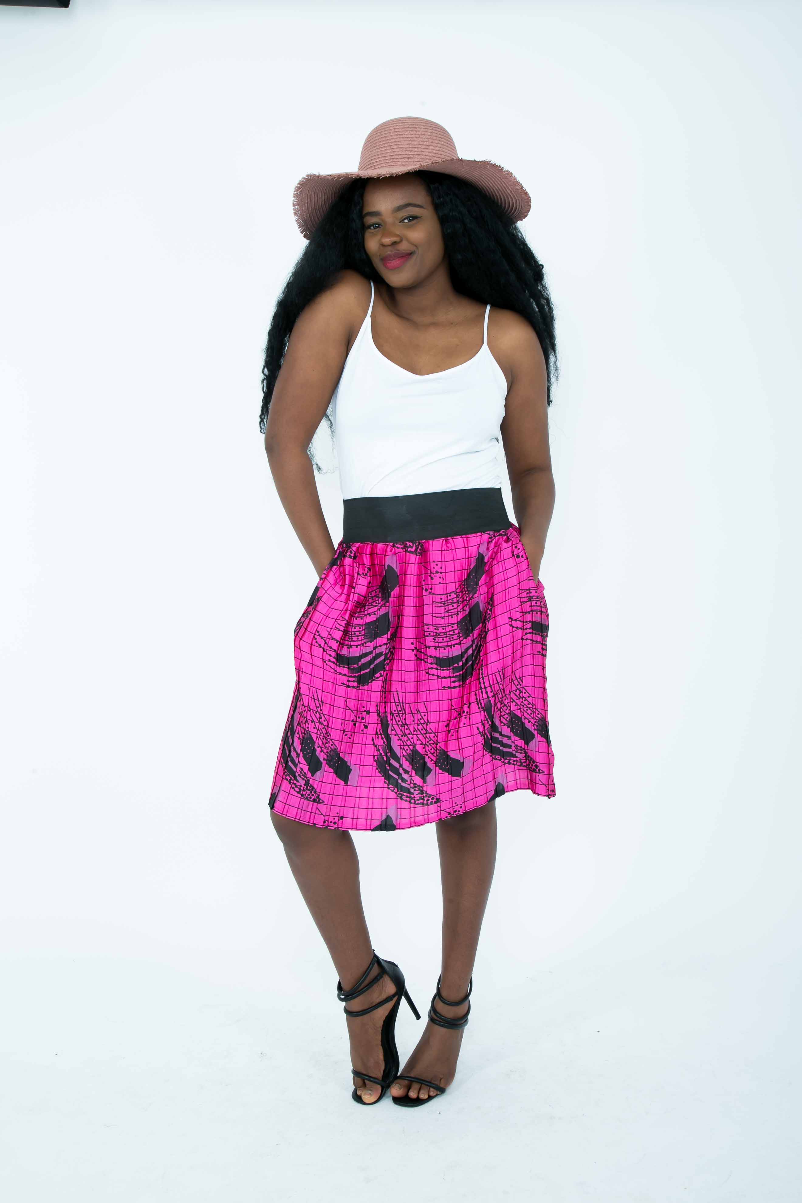 Temad collections Ankara pink silk pleated mini skirt with pockets and elasticated band