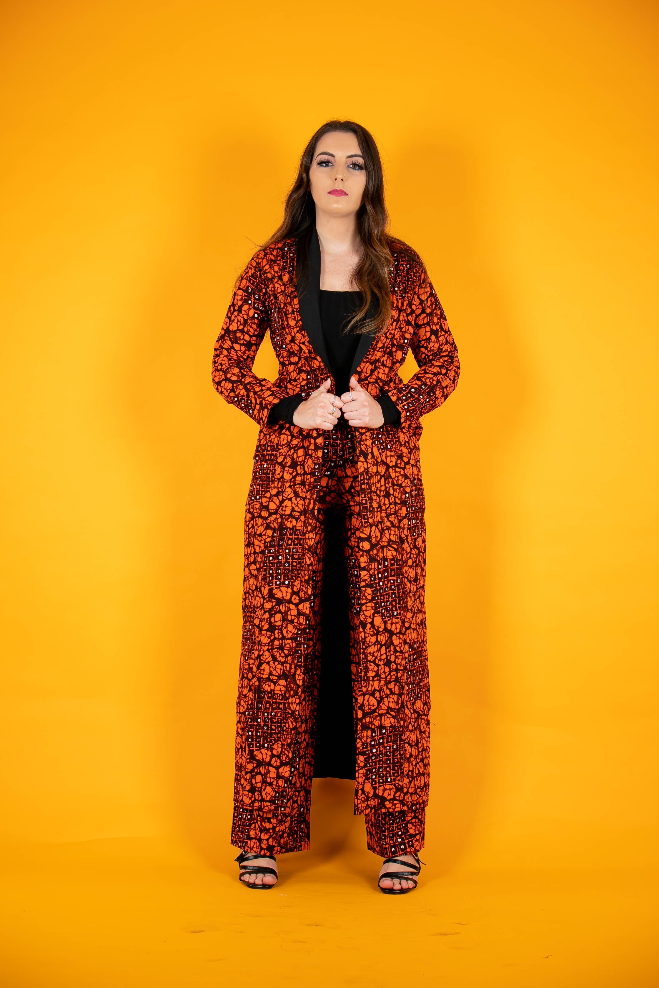 TemAD collections african print ankara imuse orange black jacket with wide leg palazzo trousers, Stylish African print bottoms and tops, African print Ankara fabric, African trousers, African palazzo , African pants , African print casual palazzo , African trousers for ladies, African flared trousers, Ankara palazzo, Ankara trousers, Ankara pants, latest Ankara palazzo, african palazzo and tops 