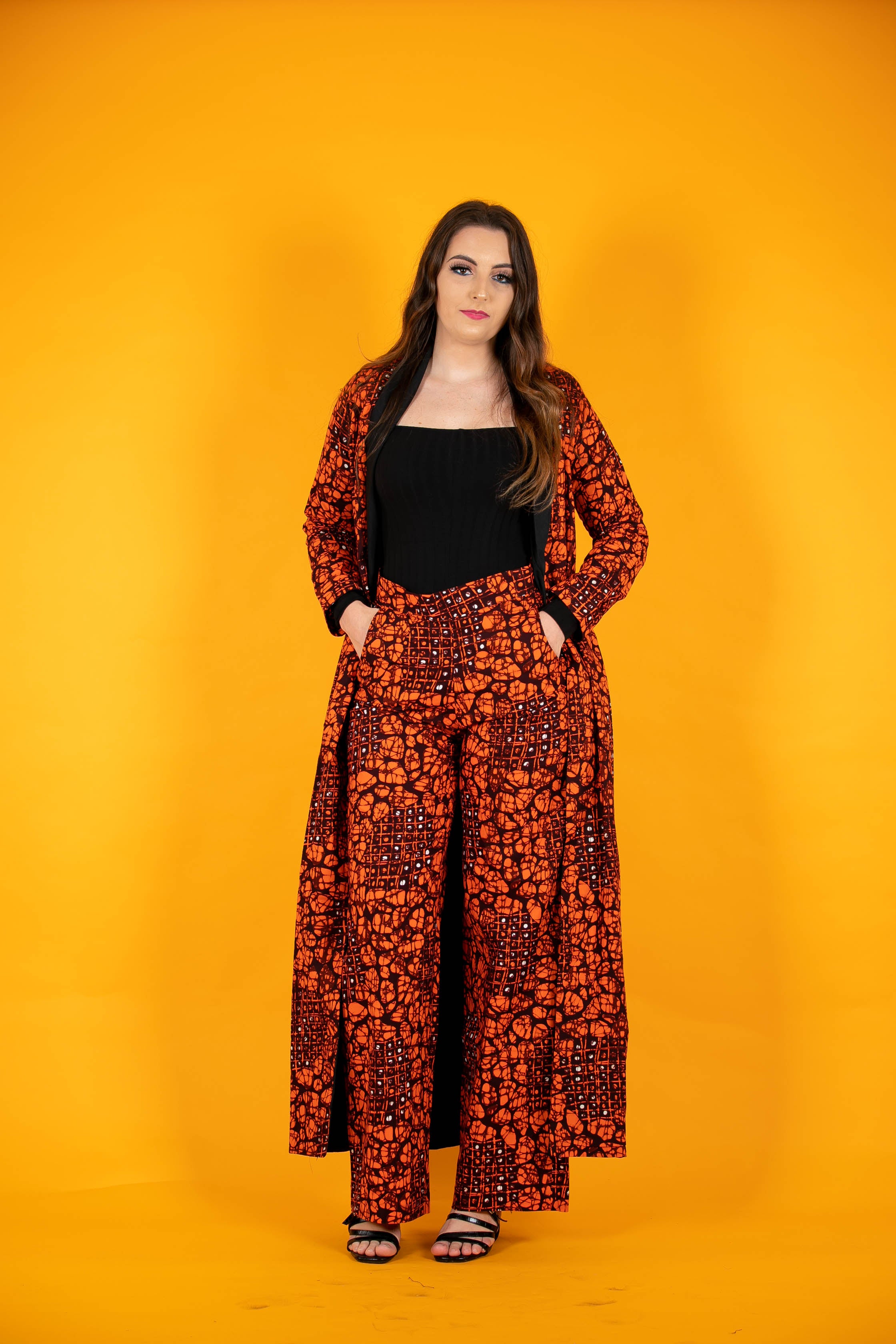 TemAD collections african print ankara imuse orange black jacket with wide leg palazzo trousers, Stylish African print bottoms and tops, African print Ankara fabric, African trousers, African palazzo , African pants , African print casual palazzo , African trousers for ladies, African flared trousers, Ankara palazzo, Ankara trousers, Ankara pants, latest Ankara palazzo, african palazzo and tops 