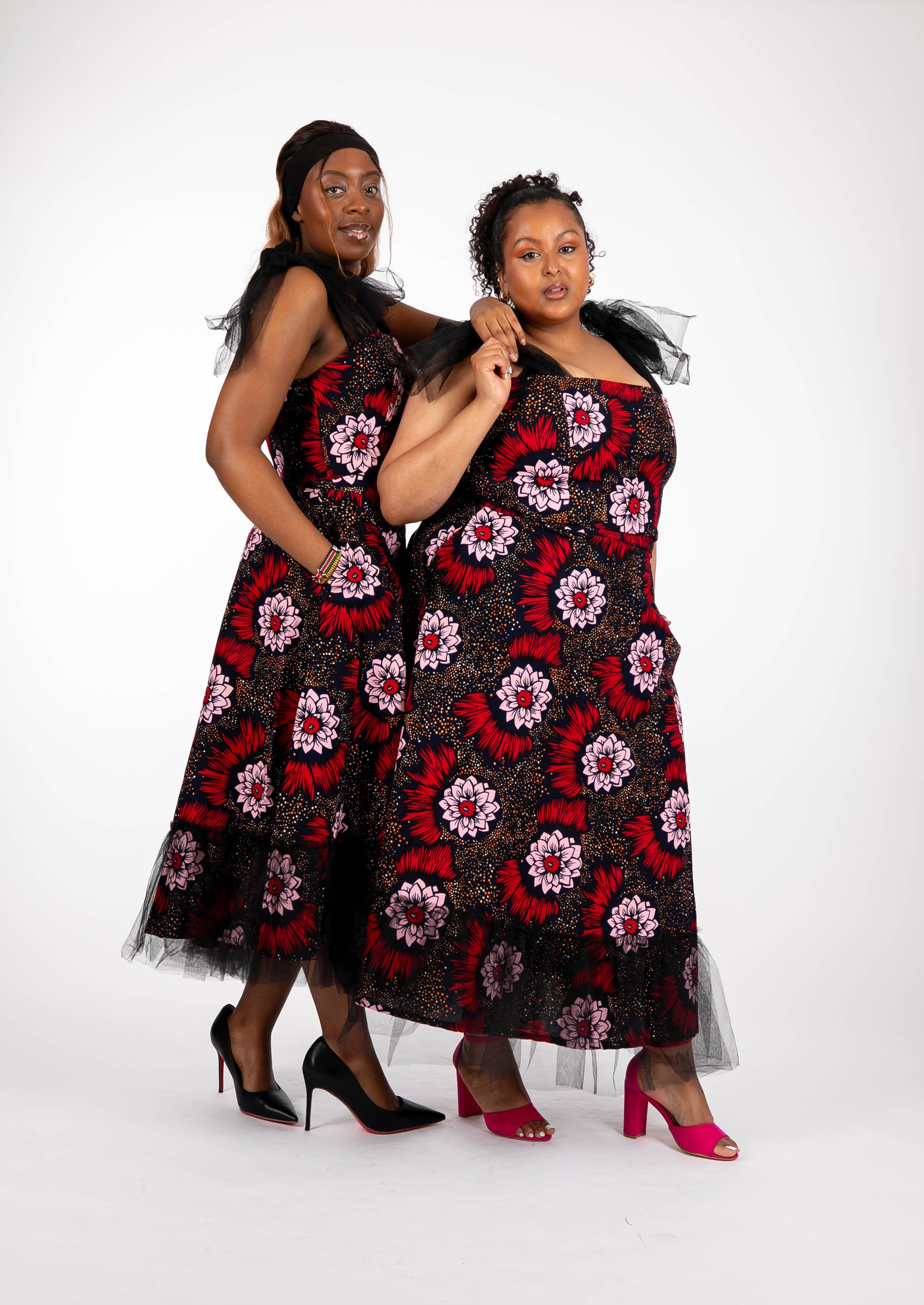 Temad collections Carino  african print ankara tulle circle skirt and crop top, Stylish African print skirts and tops, African print Ankara fabric, African tulle crop top, African crop top , African crop top , African print casual crop top , African crop top for ladies, African flared trousers, Ankara crop top, Ankara top, Ankara crop top, latest Ankara shorts, african floral shorts and tops, stylish african top,  african crop top matching skirt