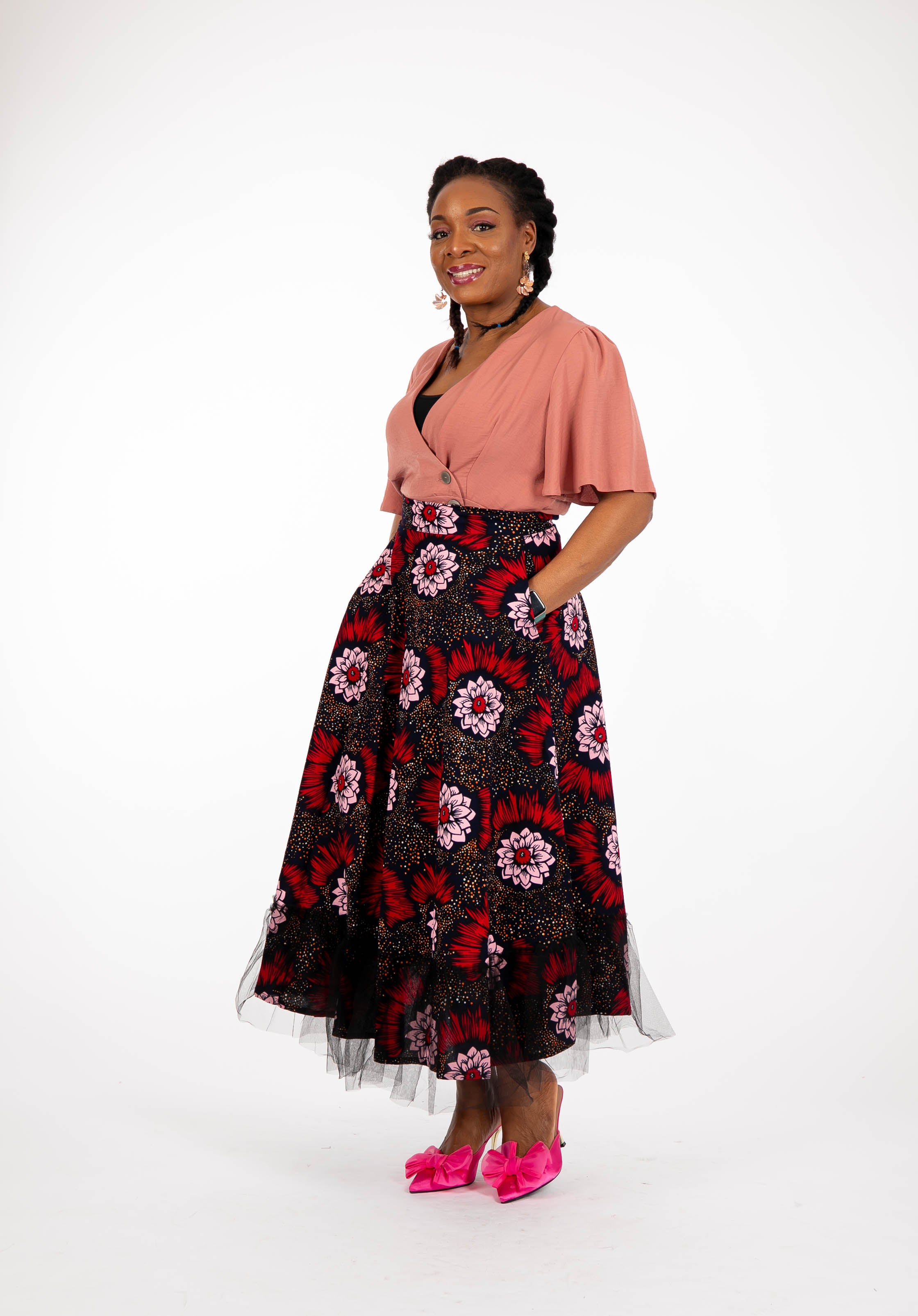 Temad collections  Carino  african print ankara midi skirt,Stylish African print skirt, Modern African skirt, Ankara skirt for ladies, Latest Ankara skirt, ankara skirt Uk, Ankara skirt styles, stylish Ankara skirt, beautiful African skirt, African Ankara skirt for ladies, African skirt styles, Ankara midi skirt, Ankara tulle skirt,  African long skirt, African short skirt,  red floral skirt, green floral skirt, ankle length skirt