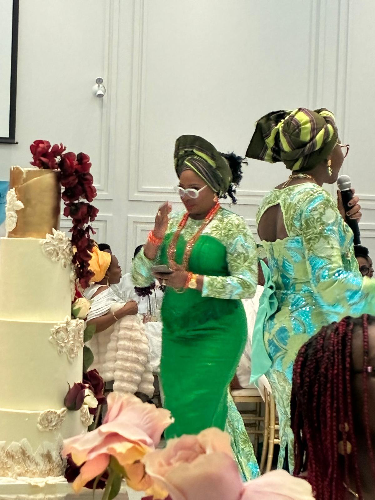 temad woman in bespoke green aso oke / lace combo