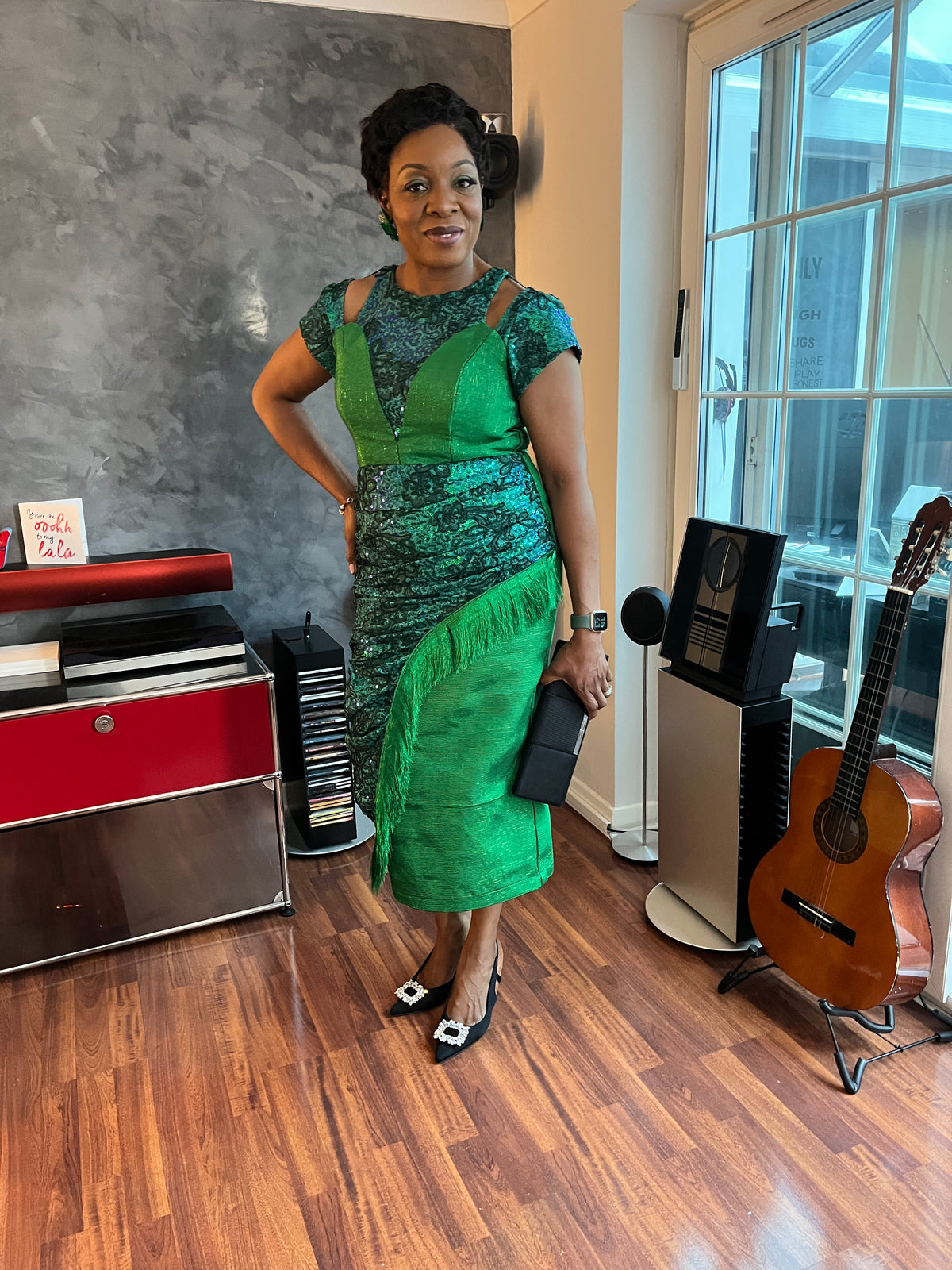 temad woman in bespoke green aso oke / lace combo