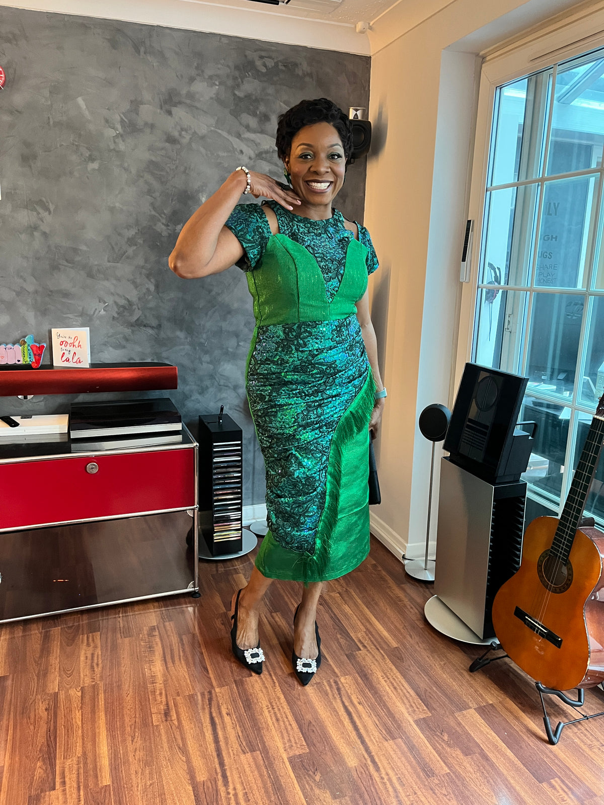 temad woman in bespoke green aso oke / lace combo