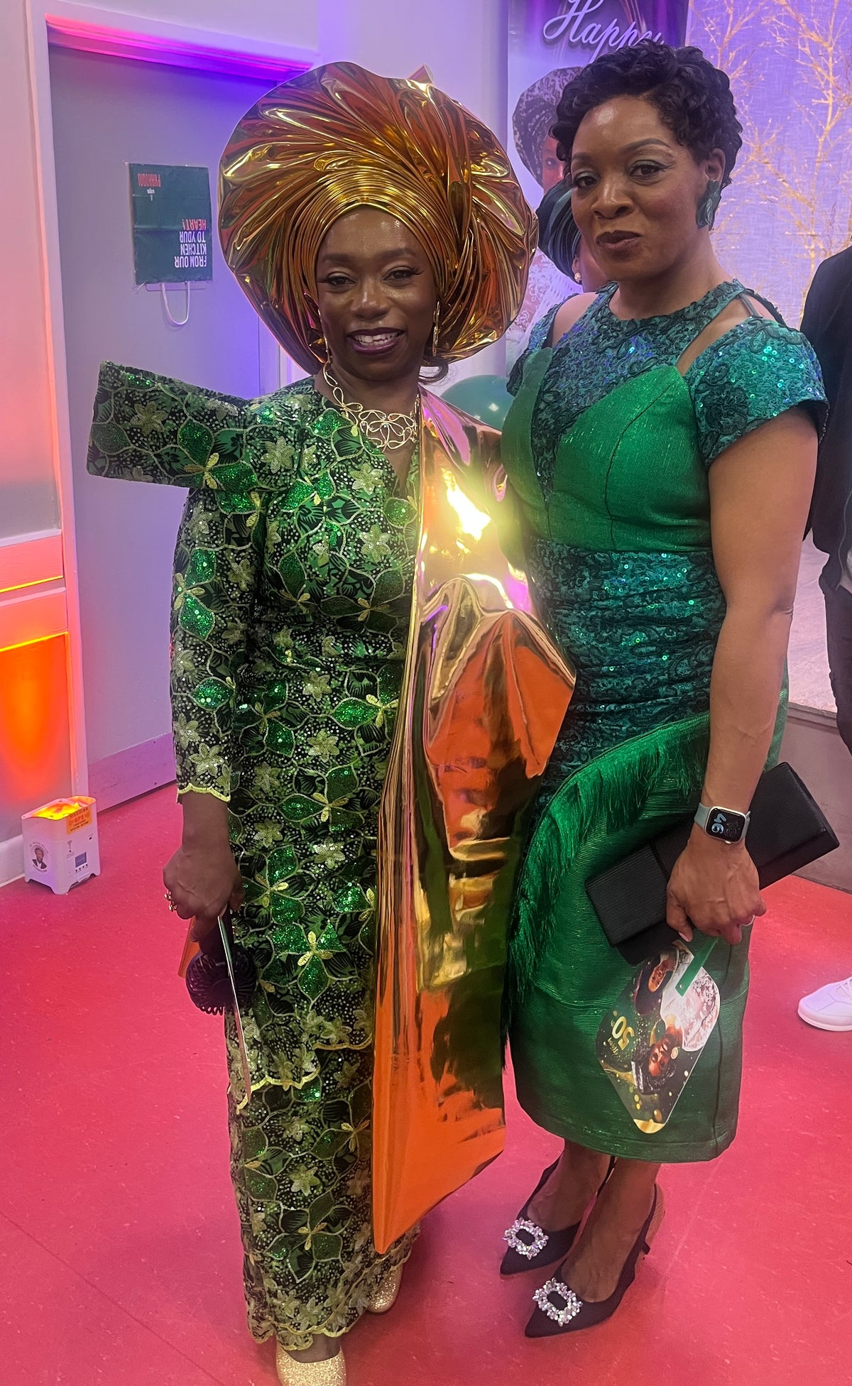 temad woman in bespoke green aso oke / lace combo