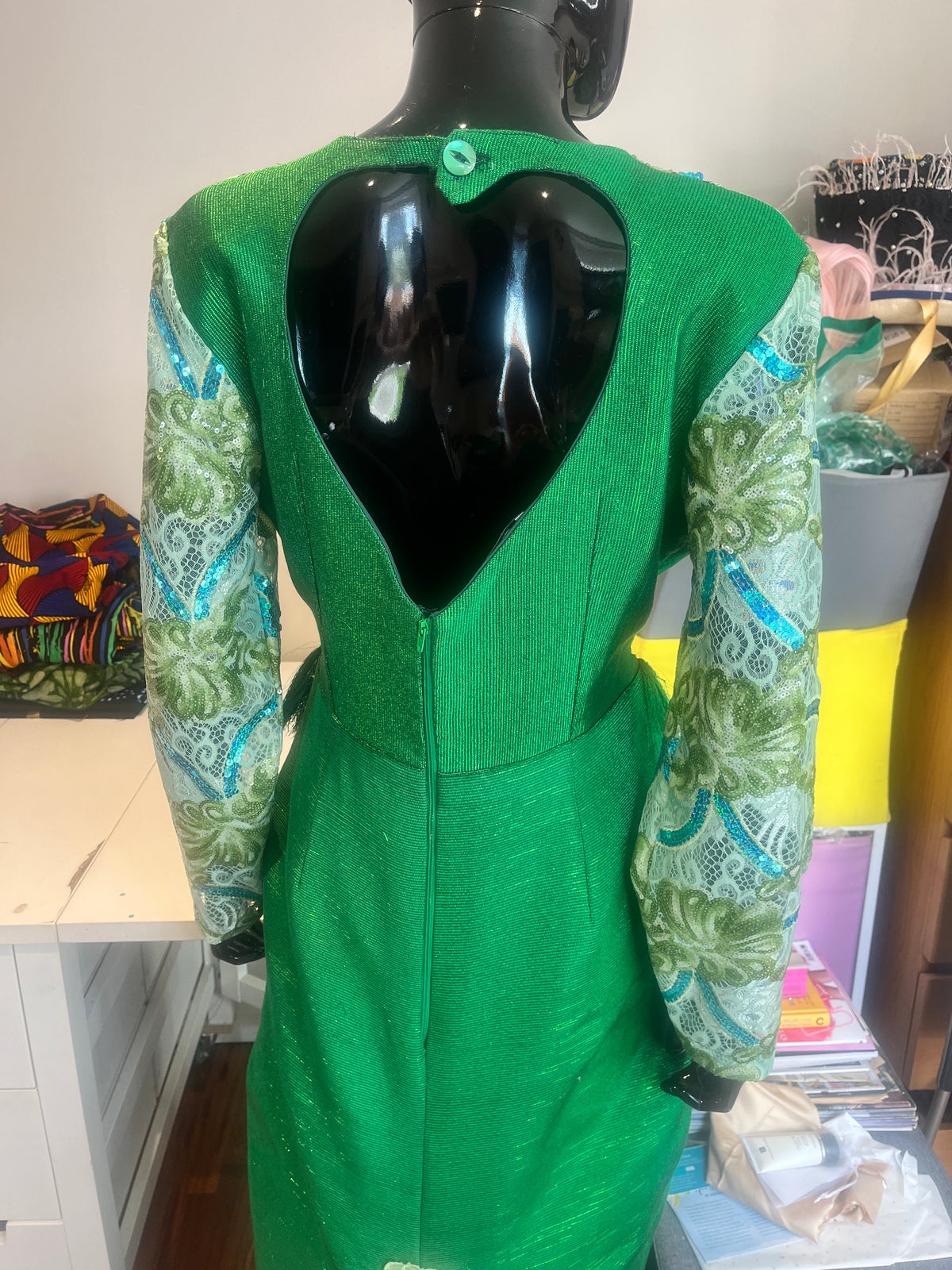 temad woman in bespoke green aso oke / lace combo